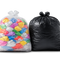 Two trash bags, one filled with colorful balloons and the other black, on a white background.