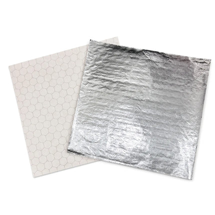 Two square adhesive patches or pads shown on a white background: one with a reflective silver foil-like surface and one with a light beige hexagonal pattern.